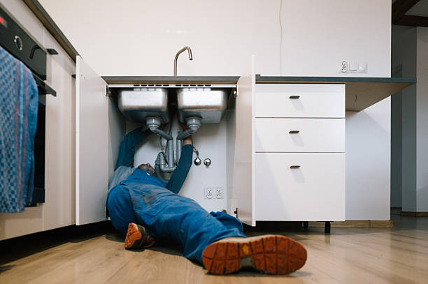 Professional Drain Cleaning technician working in Farmer City, IL